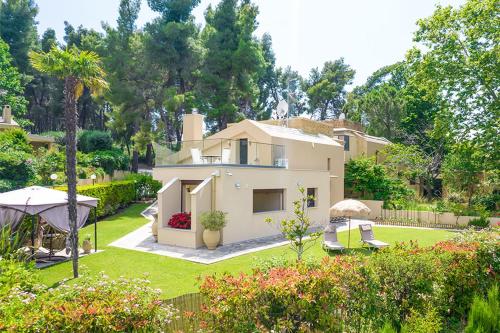 Artemisia Villa with Outdoor Hot Tub Sani Luxury Villas collection — 4-Star Luxury Hotel in Nea Fokaia, Greece