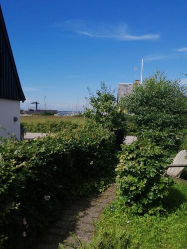 Minihus til havn strand vand og by i Gilleleje in Gilleleje, Denmark