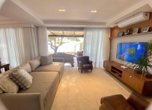 415 Casa frente mar para alugar Bombinhas com 4 suítes