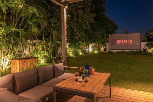 StayVista’s The Secret Lagoon with Outdoor Pool Verdant Lawn & Indoor Outdoor Activities