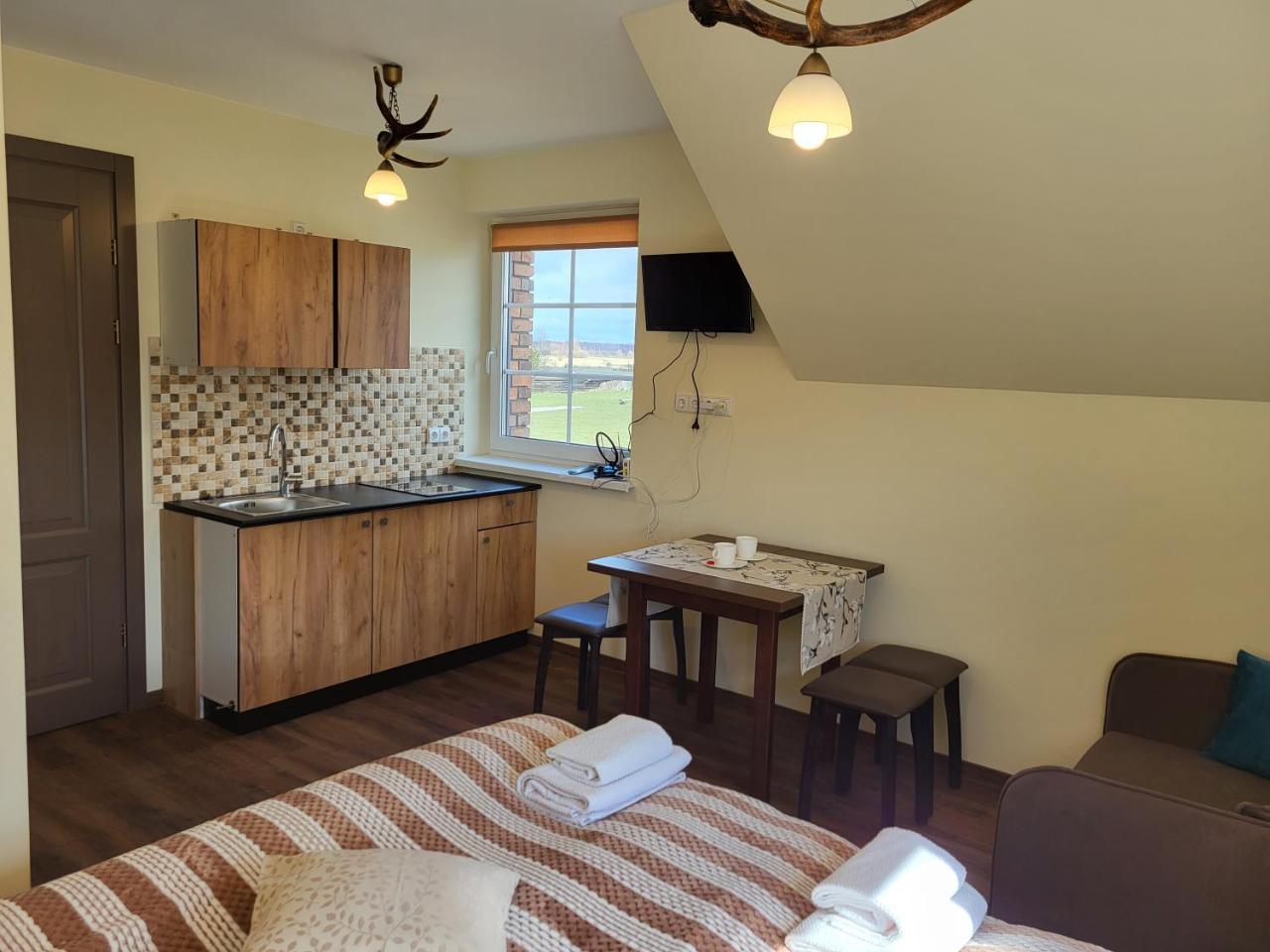 Šv Hubertas - carbon neutral hotel in Unknown City
