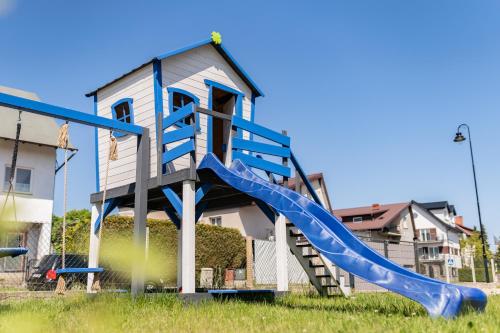 Domki U Rybaka - carbon neutral hotel in Leba