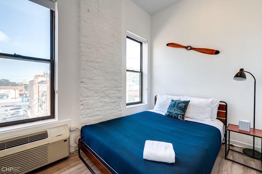 Spa Baths In unit Laundry And Full Modern Kitchen So Much More Than An Average Hotel Room 747 Lofts Cabin 302 by RedAwning - featured photo