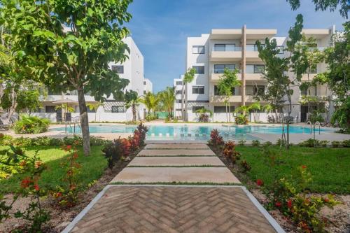 Departamento con piscina en zona tranquila a 12 minutos de la playa — 4-Star Luxury Hotel in Playa Del Carmen, Mexico