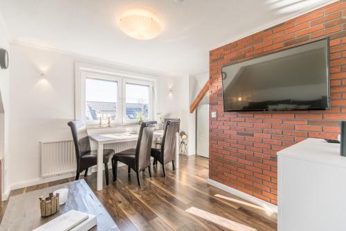 Haus Wellen und Meer Apartment 5 — 4-Star Luxury Hotel in Busum, Germany