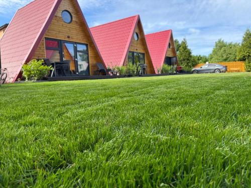 Domki w Dąbkach in Darlowo, Poland