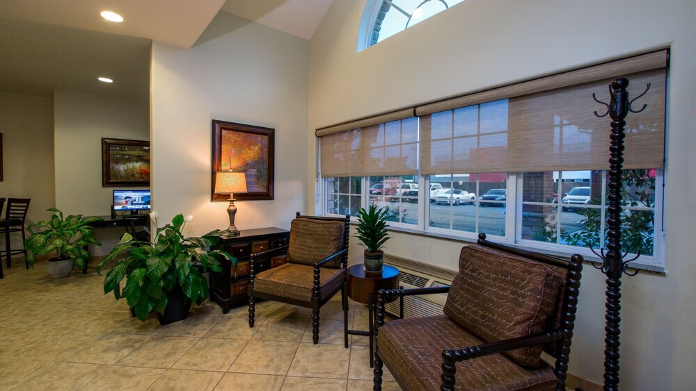 Magnolia Inn & Suites - photo 11