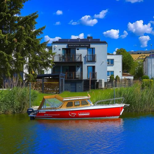 4Jeziora Prywatny Dostęp Do Rzeki Pomost Ogrodem Wiata Grillowa Rowerek Wodny Kajaki W Cenie Parking Psiaki Dozwolone — 4-Star Luxury Hotel in Ilawa, Poland