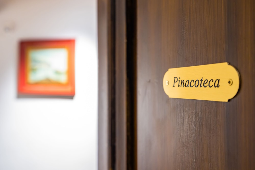 La Pinacoteca by Napoliapartments — 4-Star Luxury Hotel in Naples, Italy