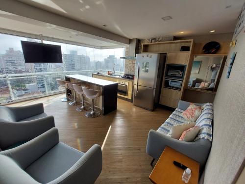 Book Santos Unlimited 1608 Panorâmico com 3 dorm in Campo Grande, Brasil