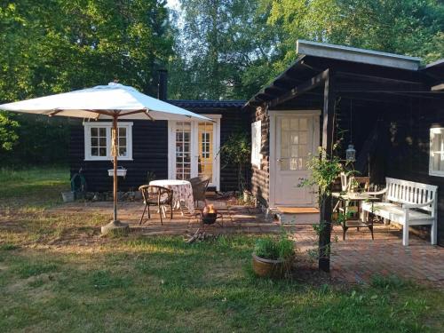 Retro And Simplicity In Two Small Houses By Arresø in Frederiksvaerk, Denmark