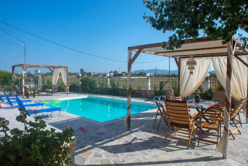 Estate Tsoukalas with Pool Perfect for Large Groups Next To Laganas Offering Incredible Greek Hospitality by Villa Mana Gers — 4-Star Luxury Hotel in Ambelokipoi, Greece