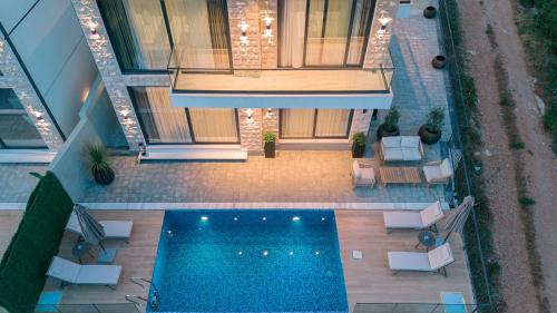 Omena Luxury Villas — Bar — photo 3