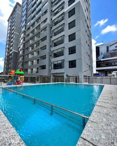 Stunning One Bedroom Apartment With Ample Parking Space Swimming Pool Fully Equipped Gym And Relaxing Rooftop With City Views
