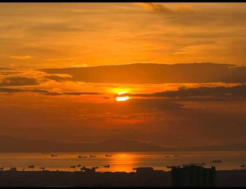 Spacious 1BR with Sunset view at The Celandine — 4-Star Luxury Hotel in Manila, Philippines