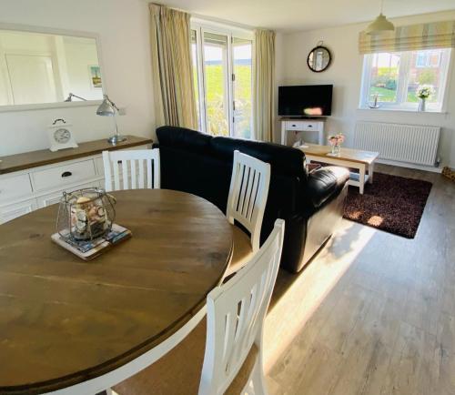 Pearl & Spice Hideaways 2 two bedroom cottages nearby Part of the The Bay Filey Holiday Village with pool gym and direct beach access pub restaurant tennis and meadows walks