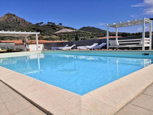 Attico con sauna e piscina a Porto Azzurro — 4-Star Luxury Hotel in Porto Azzurro, Italy
