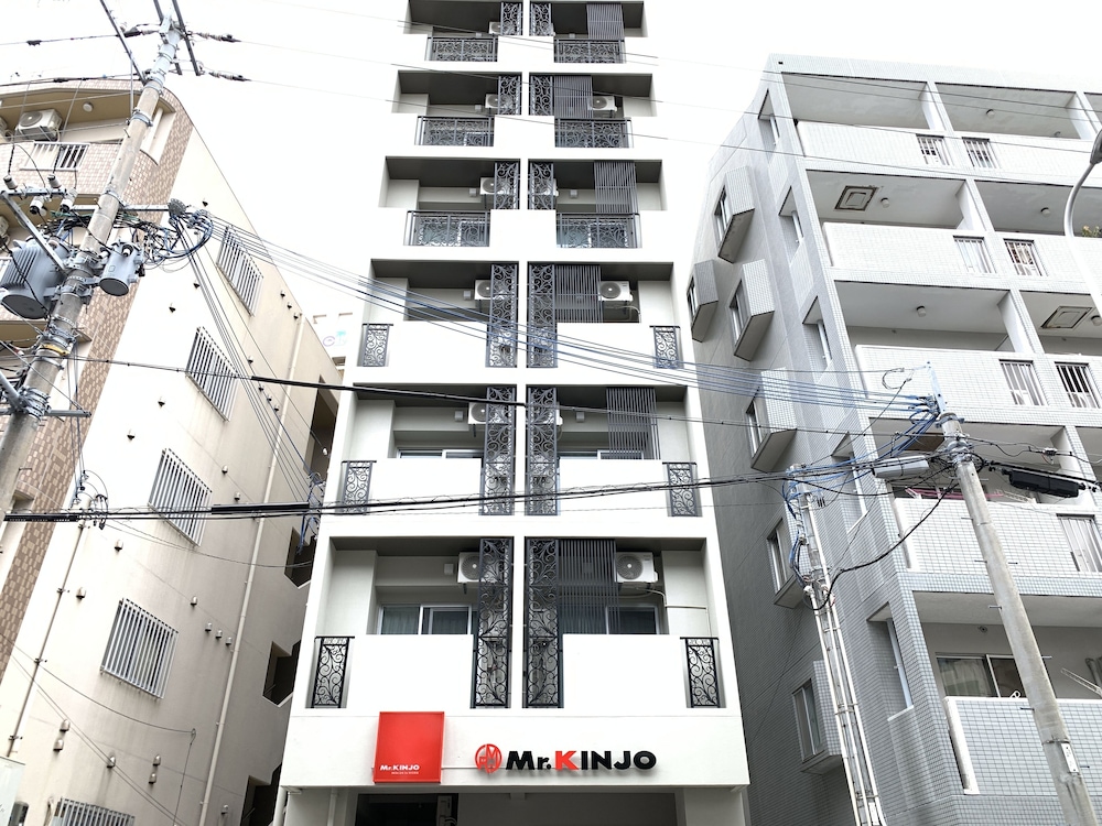 Mr.KINJO Miki24 in front of Makishi Station in Naha, Japan