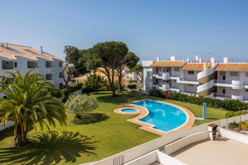 Modern Apartment with Pool & Garden Close to Marina — 4-Star Luxury Hotel in Quarteira, Portugal