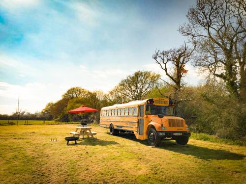 American School Bus Glamping with Hot Tub in Woolacombe in Barnstaple, United Kingdom