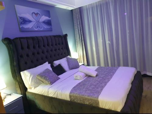 Elegant classy apartment with modern equipped gym private parking space and proximity to major shopping malls