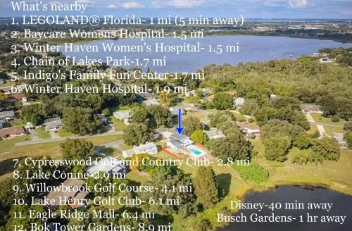 Stylish Lake home with HUGE POOL Arcade with PS5 and Theater Just 5 min from Legoland — 4-Star Luxury Hotel in Winter Haven, United States