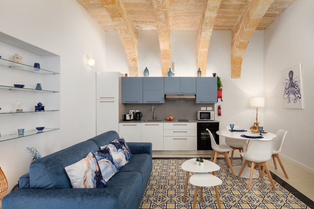 Modern Traditional Apartment with Maltese Internal Court Yard Designed with Traditional Stone and Tiling — 4-Star Luxury Hotel in Valletta, Malta