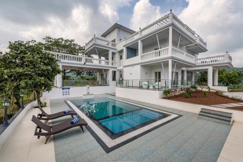 Saffronstays Ivory Mansion — Pen