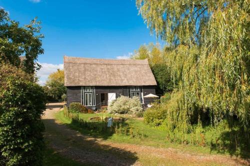 Deepwell Granary is a lovely thatched barn with attached meadow woodland in Stowmarket, United Kingdom
