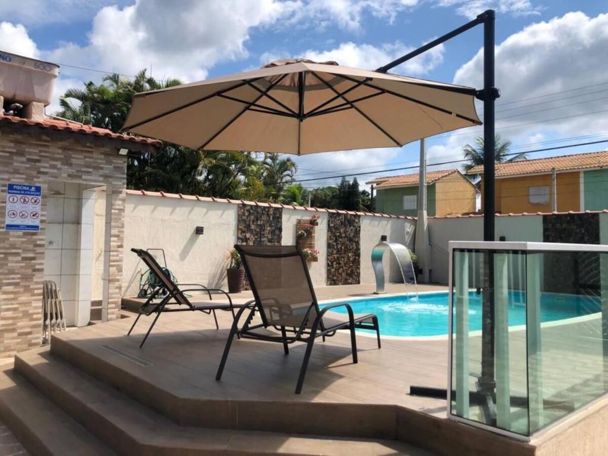 Piscina aquecida 3 dorms ar condicionado Cervejeira e Bilhar a 500 metros do Mar in Bertioga, Brasil