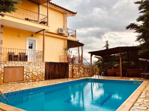 Villa Saron — 4-Star Luxury Hotel in Korinthos, Greece