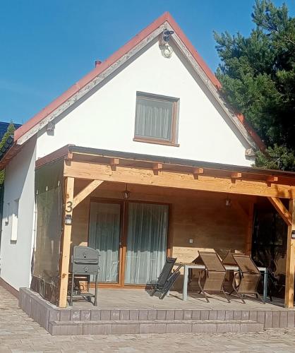 Domki u Eweli CAŁOROCZNE ogrzewane kominkiem in Stegna, Poland