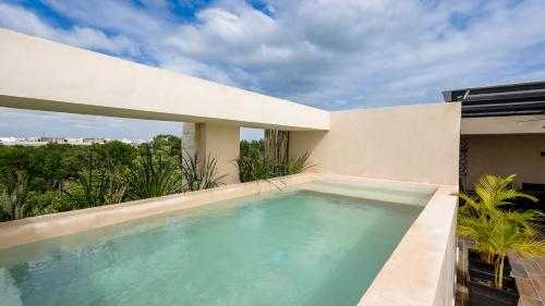 Sunset Serenity Amply Private Terrace & Pool & Gym & Beach club access — 4-Star Luxury Hotel in Tulum, Mexico