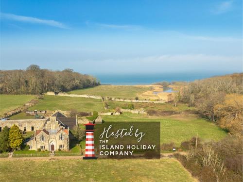 The Old Abbey Farmhouse Stay at Quarr Abbey Monastery Pet Friendly Farmhouse with History & Countryside Views surrounded by woodland & nature — 4-Star Luxury Hotel in Ryde, United Kingdom