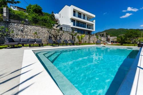Villa K Opatija with a heated pool gym sauna astonishing sea view — 5-Star Luxury Hotel in Opatija, Croatia