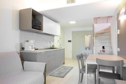 Appartamento Campagnola Mansardato con soppalco — 4-Star Luxury Hotel in Riva Del Garda, Italy