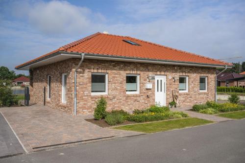 Ferienhaus Seeblick - carbon neutral hotel in Walchum