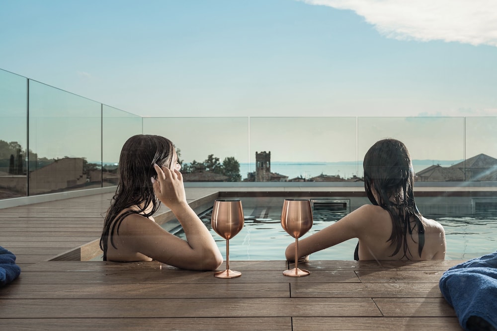 Wanderlust Hotel Suite & Spa Apartments & Villas Bardolino Lago Di Garda Verona in Bardolino, Italy