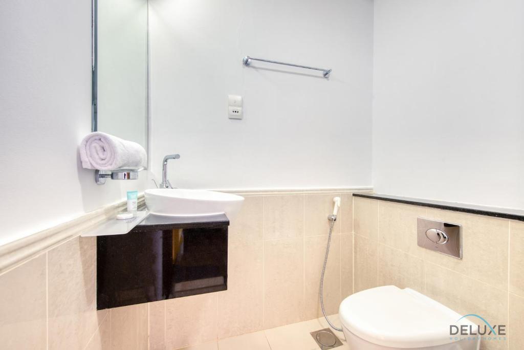 Homely 1BR at The Matrix Dubai Sports City by Deluxe Holiday Homes — 4-Star Luxury Hotel in Dubai, United Arab Emirates