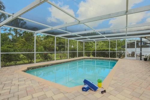 Sunset Poolhouse Pool Firepit Playset Games in Clearwater, United States