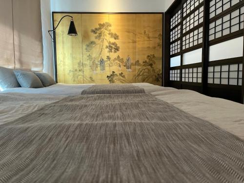 源泉かけ流しの一棟貸し温泉宿the Feet Dogo — 4-Star Luxury Hotel in Matsuyama, Japan