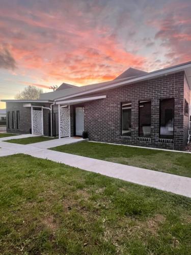 Four Square Short Stay Accommodation Railton - carbon neutral hotel in Unknown City