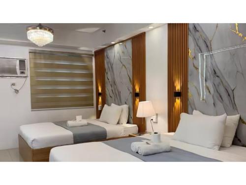 Relax in Pasay Citys Best Kept Secret Spacious Condo with Garden View — 4-Star Luxury Hotel in Manila, Philippines