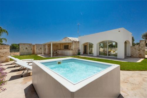 Trullo Pumo by Perle di Puglia — 4-Star Luxury Hotel in San Michele Salentino, Italy