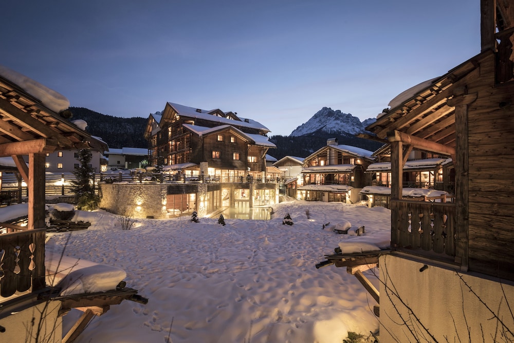 Post Alpina Family Mountain Chalets — 4-Star Luxury Hotel in San Candido, Italy