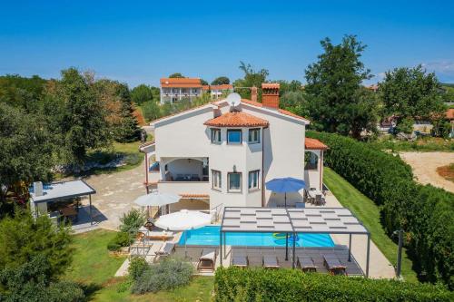 Villa Eufemia near Poreč with large garden and outdoor playground for kids — 4-Star Luxury Hotel in Porec, Croatia