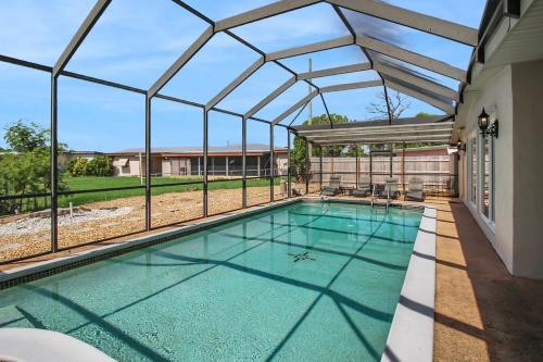 Canal Front Escape with Private Pool & Game Room in Port Charlotte in Port Charlotte, United States