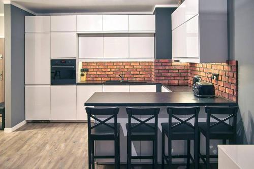 Uroczy Apartament z Garażem — 4-Star Luxury Hotel in Krakow, Poland