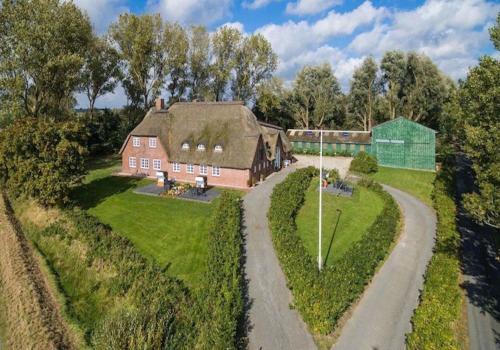 Haubarg Ossenhoff Haubarg Ossenhoff Appartement Kohstall — 4-Star Luxury Hotel in Tating, Germany