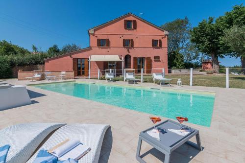 Casa Rossa — 4-Star Luxury Hotel in San Costanzo, Italy